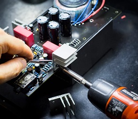 Assembling an electronic component.